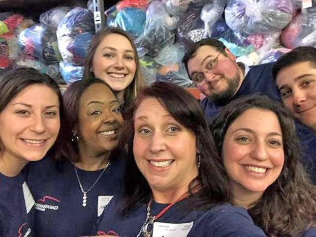 Environmental team colunteering at Cradles to Crayons