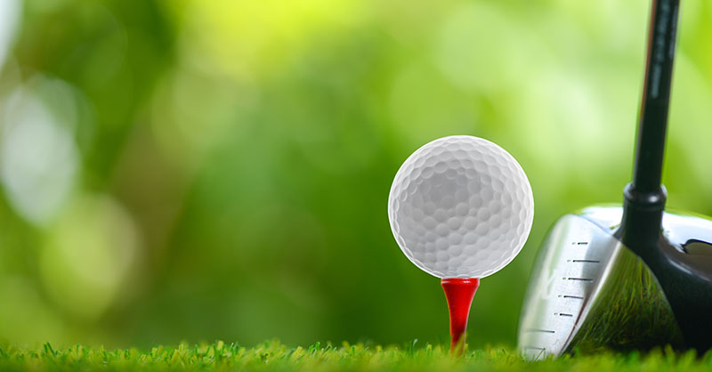Golf ball and club