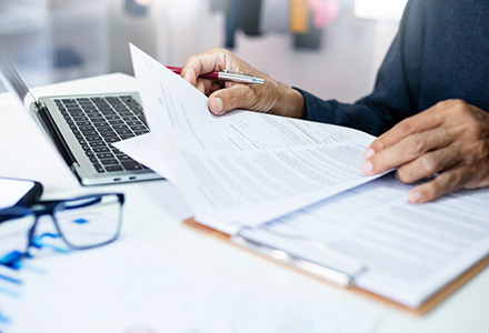 A person working on claims.